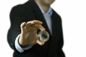 1281812_businessman_holding_crystal_globe